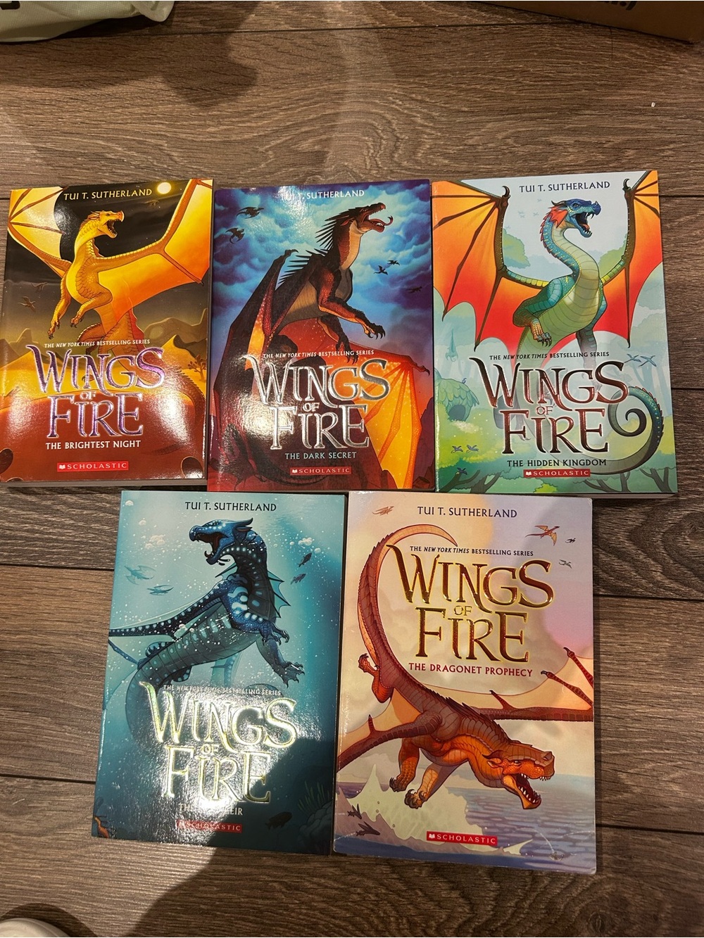 Scholastic Wings of Fire book set β orange, blue, teal, red